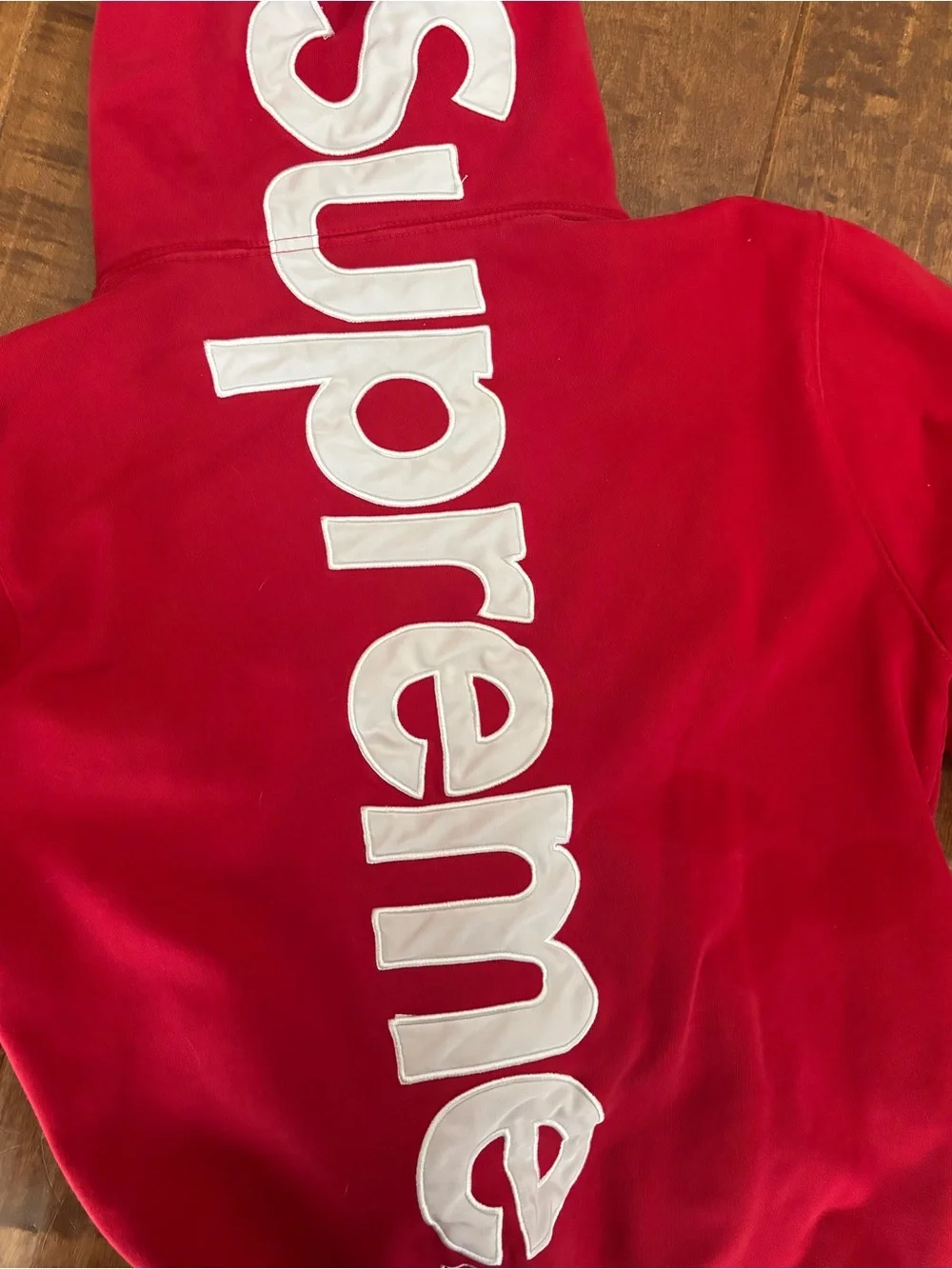 Supreme Red Hoodie with White Logo Tag